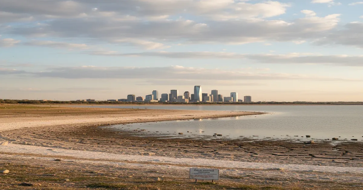 Oklahoma City skyline with the Oklahoma River in the foreground, in a region where water supply depends on distant reservoirs
